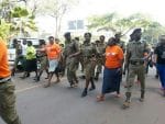 Ug Police Wearing Lady Shoes - Spur Magazine